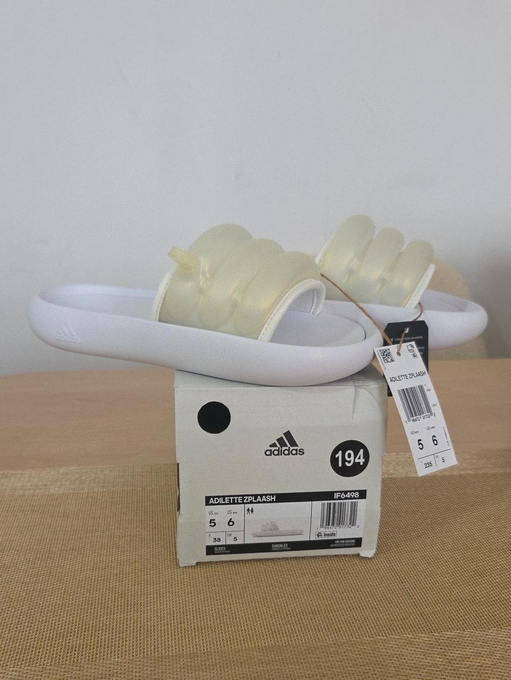 adidas Women's White Slides with Translucent Pale Yellow Strap